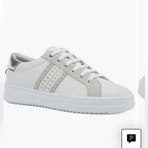 Stylish sneakers with tasteful silver accents!